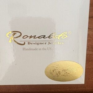 Ronaldo Gold & Silver Bracelet like new. Kept in original box worn few times.